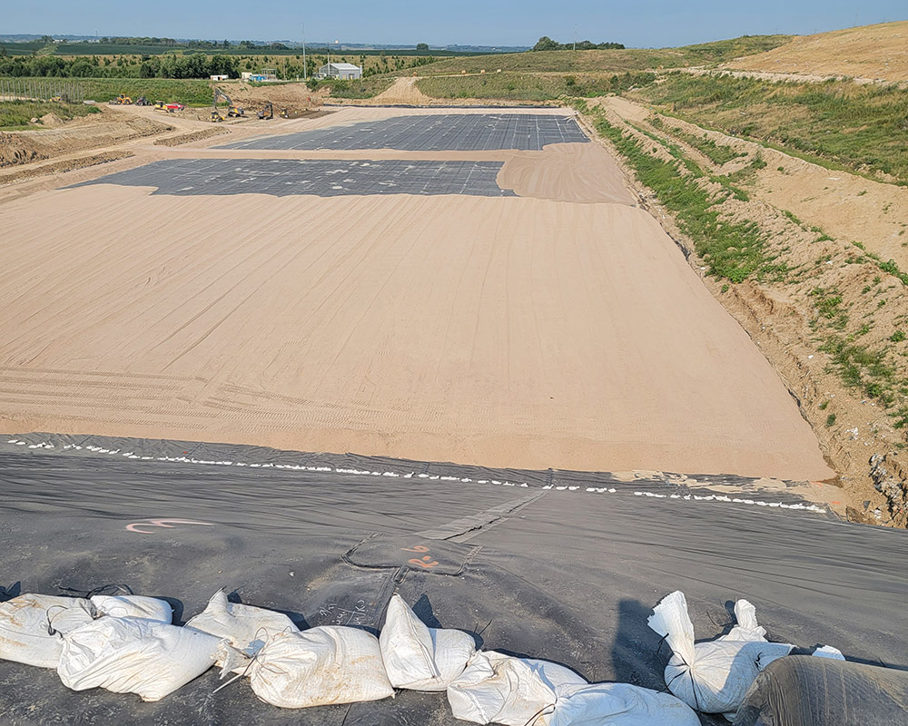 Cover Material Installed on Top of Installed HDPE Liner at a Landfill